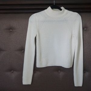 White turtleneck knit sweater